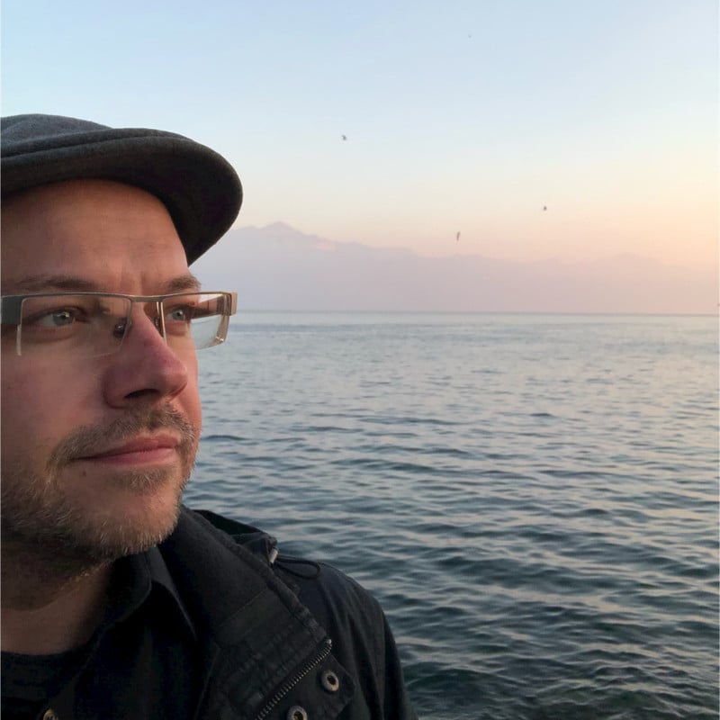 Jason Krajewski next to sunset